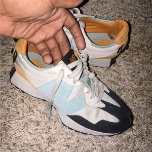 New Balance Men's Black, White, and Blue Sneakers